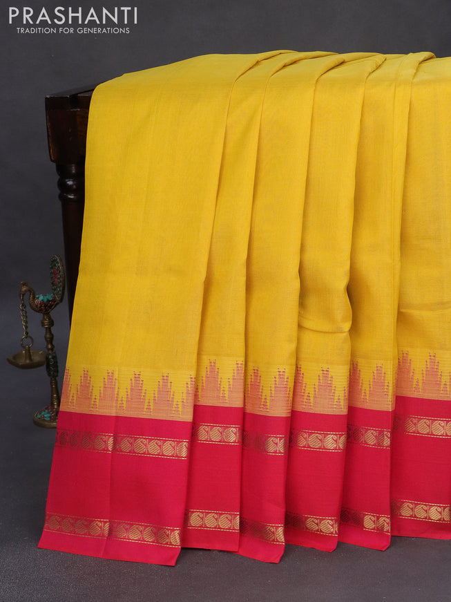 Silk cotton saree mustard yellow and pink with plain body and temple design rettapet zari woven korvai border