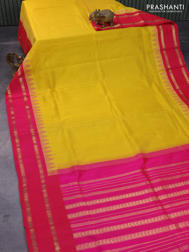 Silk cotton saree mustard yellow and pink with plain body and temple design rettapet zari woven korvai border