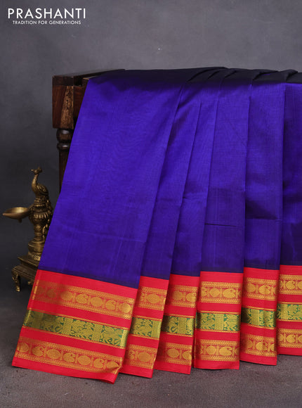 Silk cotton saree blue and red with plain body and zari woven korvai border