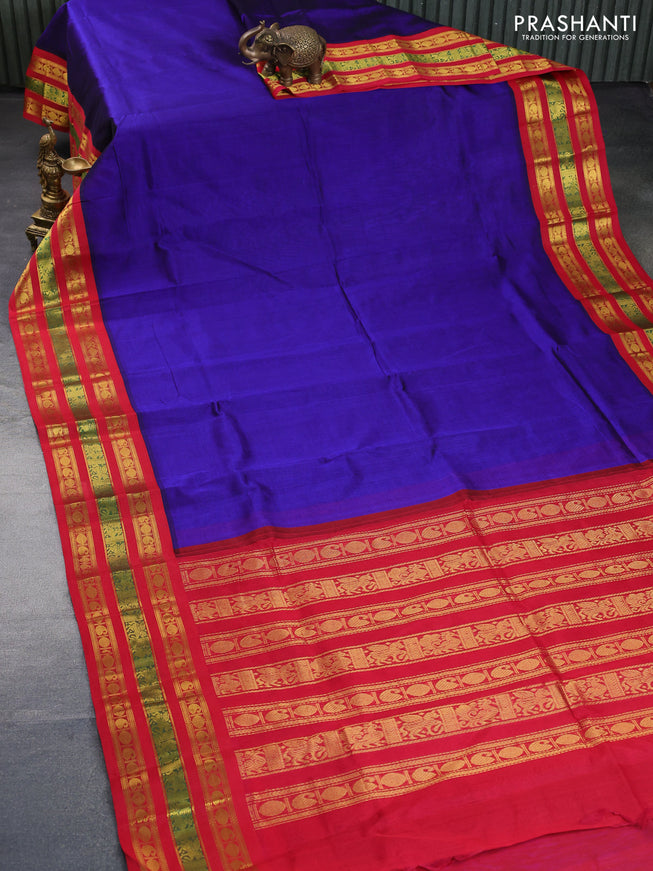 Silk cotton saree blue and red with plain body and zari woven korvai border