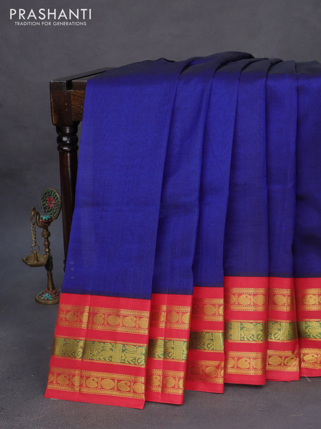 Silk cotton saree blue and red with plain body and zari woven korvai border