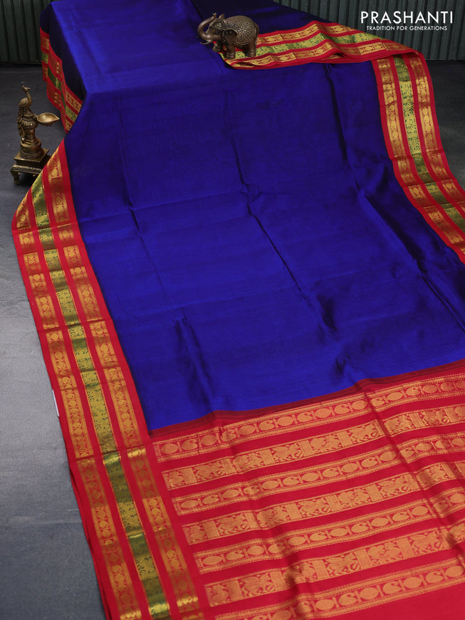 Silk cotton saree blue and red with plain body and zari woven korvai border