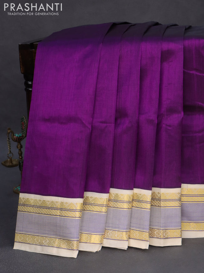 Silk cotton saree deep purple and cream with plain body and zari woven korvai border