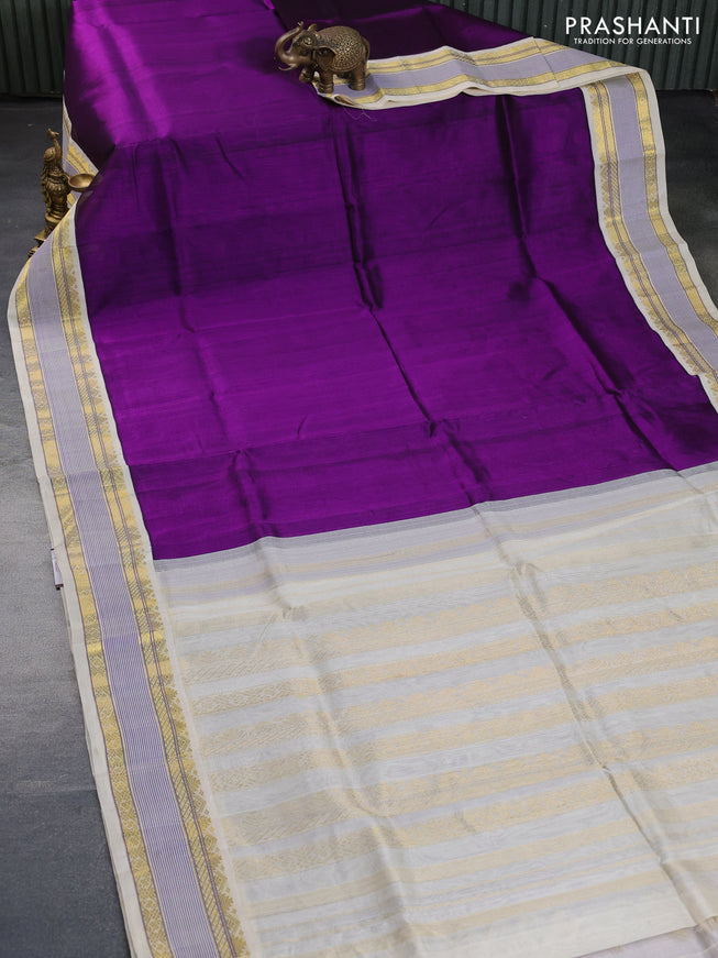 Silk cotton saree deep purple and cream with plain body and zari woven korvai border