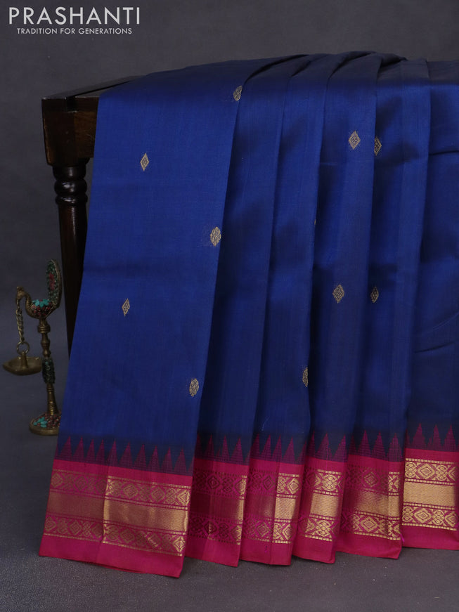 Silk cotton saree dark peacock blue and pink with zari woven buttas and teample design zari woven korvai border