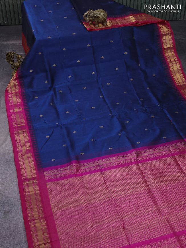 Silk cotton saree dark peacock blue and pink with zari woven buttas and teample design zari woven korvai border