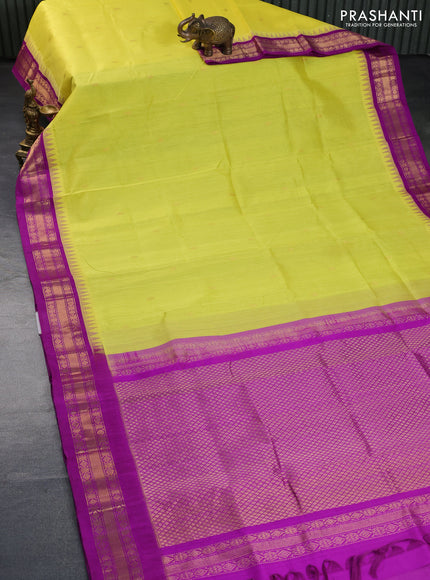 Silk cotton saree lime yellow and purple with zari woven buttas and teample design zari woven korvai border