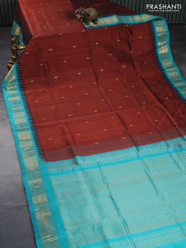 Silk cotton saree brown and teal blue with zari woven buttas and teample design zari woven korvai border