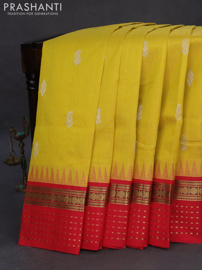 Silk cotton saree lime yellow and red with zari woven buttas and teample design zari woven korvai border