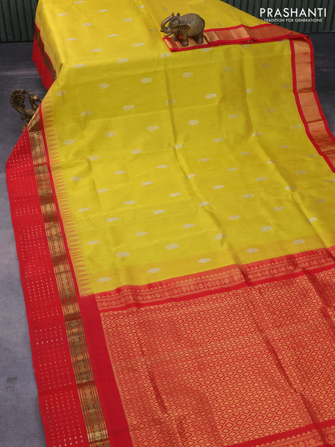 Silk cotton saree lime yellow and red with zari woven buttas and teample design zari woven korvai border