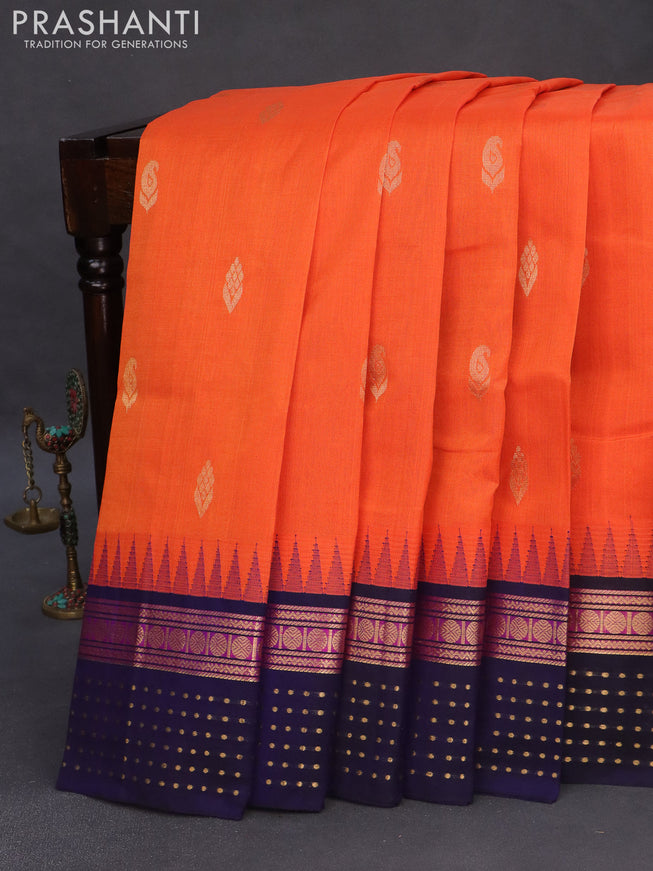 Silk cotton saree orange and navy blue with zari woven buttas and teample design zari woven korvai border