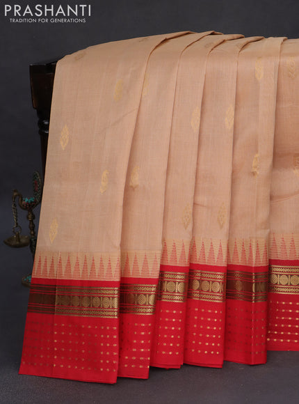 Silk cotton saree sandal and red with zari woven buttas and teample design zari woven korvai border