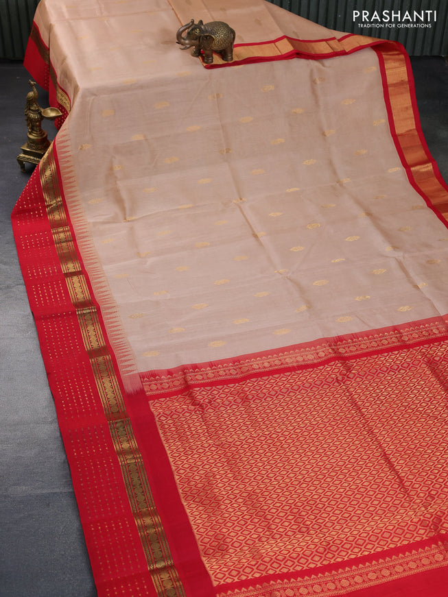 Silk cotton saree sandal and red with zari woven buttas and teample design zari woven korvai border