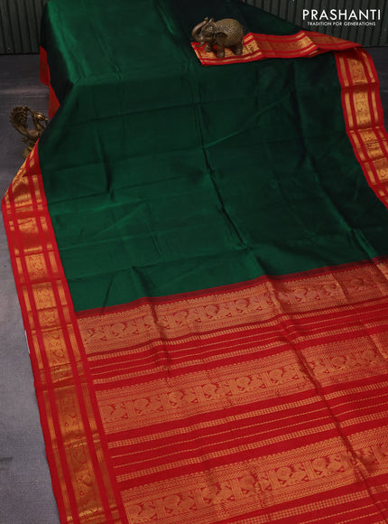 Silk cotton saree dark green and red with plain body and zari woven korvai annam border