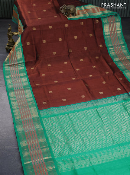 Silk cotton saree brown and teal blue with zari woven elephant buttas and long zari woven korvai border