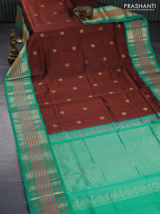 Silk cotton saree brown and teal blue with zari woven elephant buttas and long zari woven korvai border