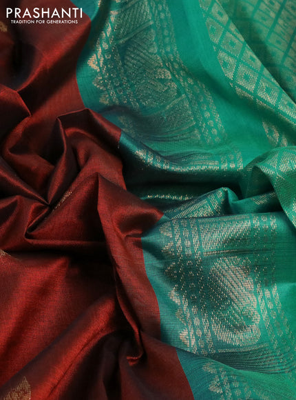 Silk cotton saree brown and teal blue with zari woven elephant buttas and long zari woven korvai border