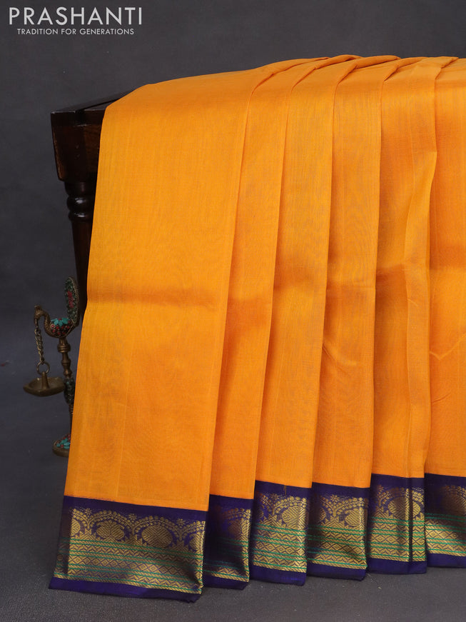 Silk cotton saree mango yellow and blue with plain body and zari woven korvai border