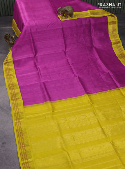 Silk cotton saree magenta pink and yellow with plain body and zari woven korvai border