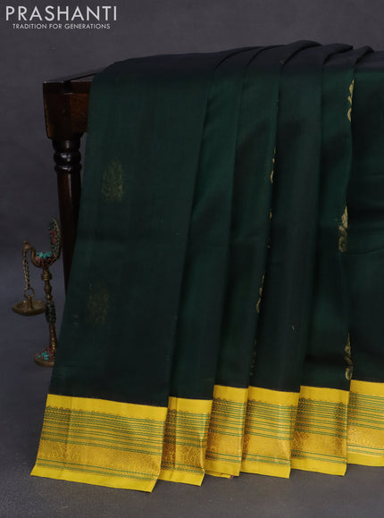 Silk cotton saree dark green and lime yellow with zari woven buttas and zari woven korvai border