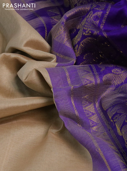 Silk cotton saree beige and blue with plain body and temple design rettapet zari woven korvai border