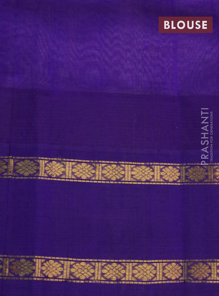 Silk cotton saree beige and blue with plain body and temple design rettapet zari woven korvai border