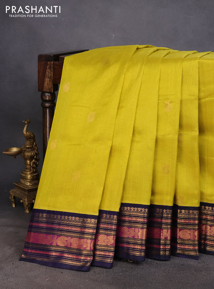 Silk cotton saree lime yellow and navy blue with zari woven buttas and zari woven korvai border