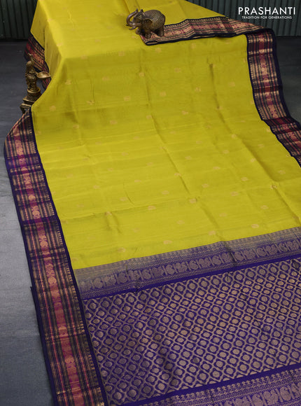 Silk cotton saree lime yellow and navy blue with zari woven buttas and zari woven korvai border