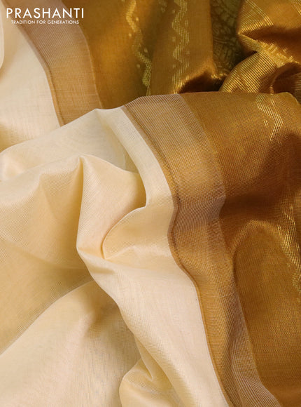 Silk cotton saree cream and mustard shade with plain body and zari woven annam korvai border