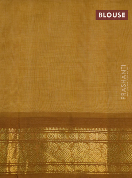 Silk cotton saree cream and mustard shade with plain body and zari woven annam korvai border