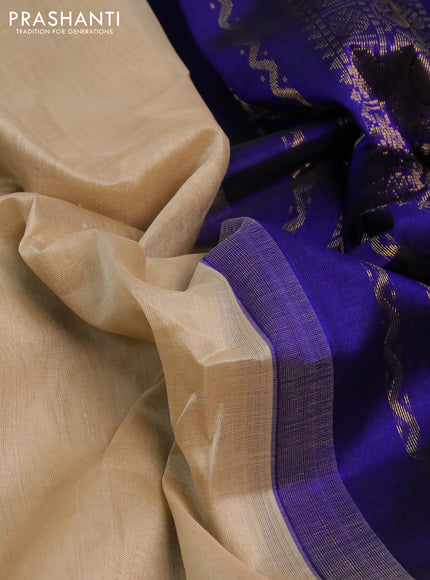 Silk cotton saree beige and blue with plain body and zari woven annam korvai border