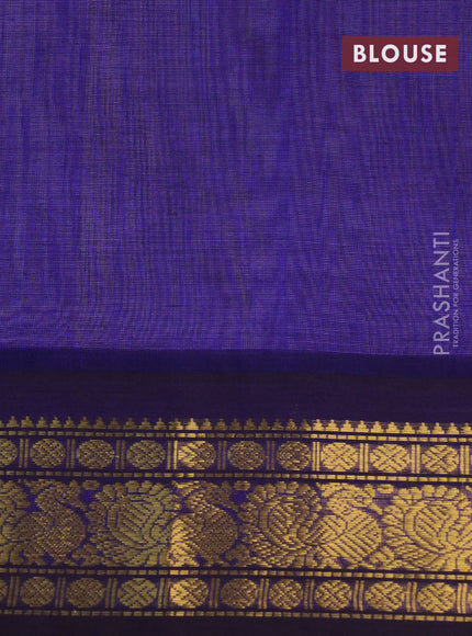 Silk cotton saree beige and blue with plain body and zari woven annam korvai border