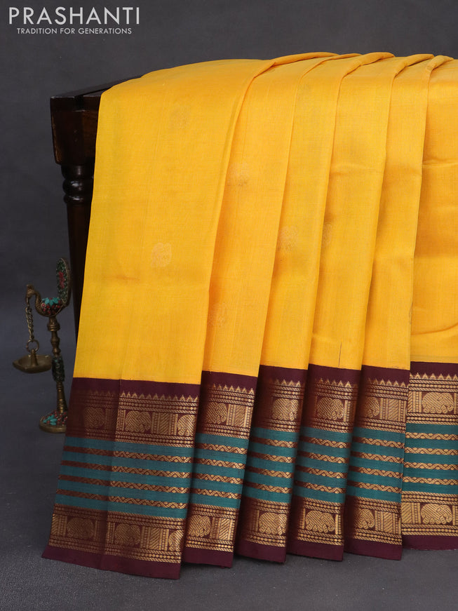 Silk cotton saree mango yellow and wine shade with zari woven elephant buttas and long zari woven korvai border