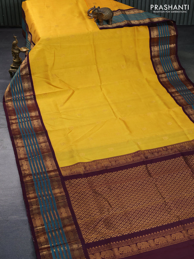 Silk cotton saree mango yellow and wine shade with zari woven elephant buttas and long zari woven korvai border