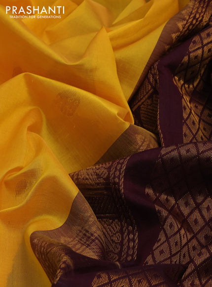 Silk cotton saree mango yellow and wine shade with zari woven elephant buttas and long zari woven korvai border