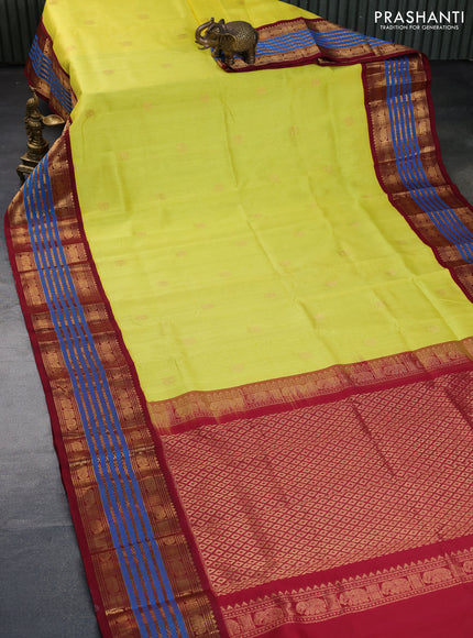 Silk cotton saree lime yellow and maroon with zari woven elephant buttas and long zari woven korvai border