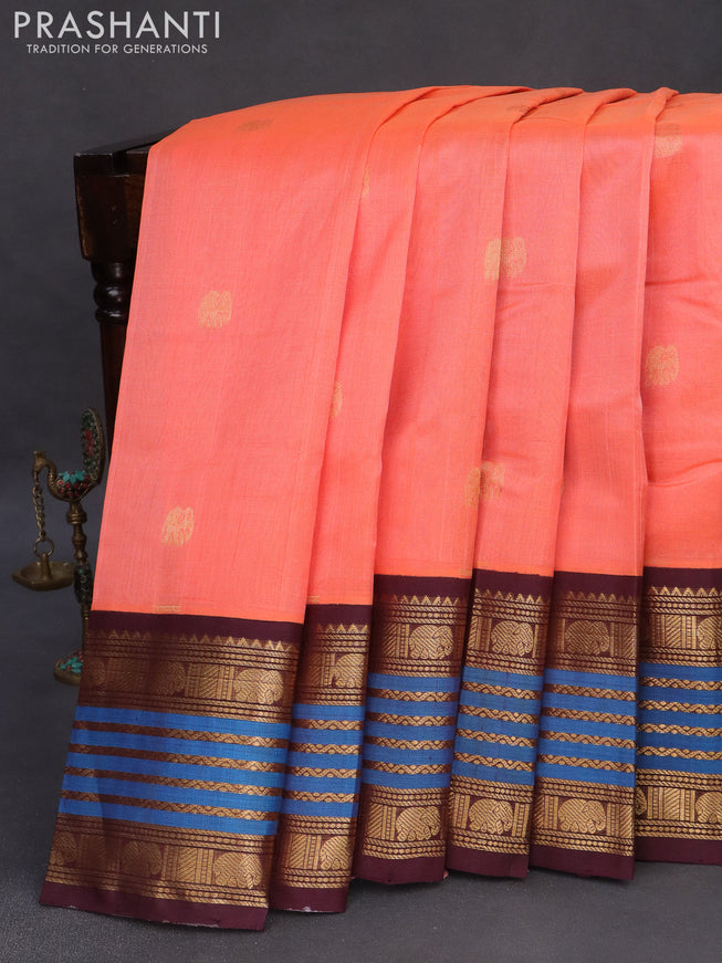 Silk cotton saree peach pink and wine shade with zari woven elephant buttas and long zari woven korvai border