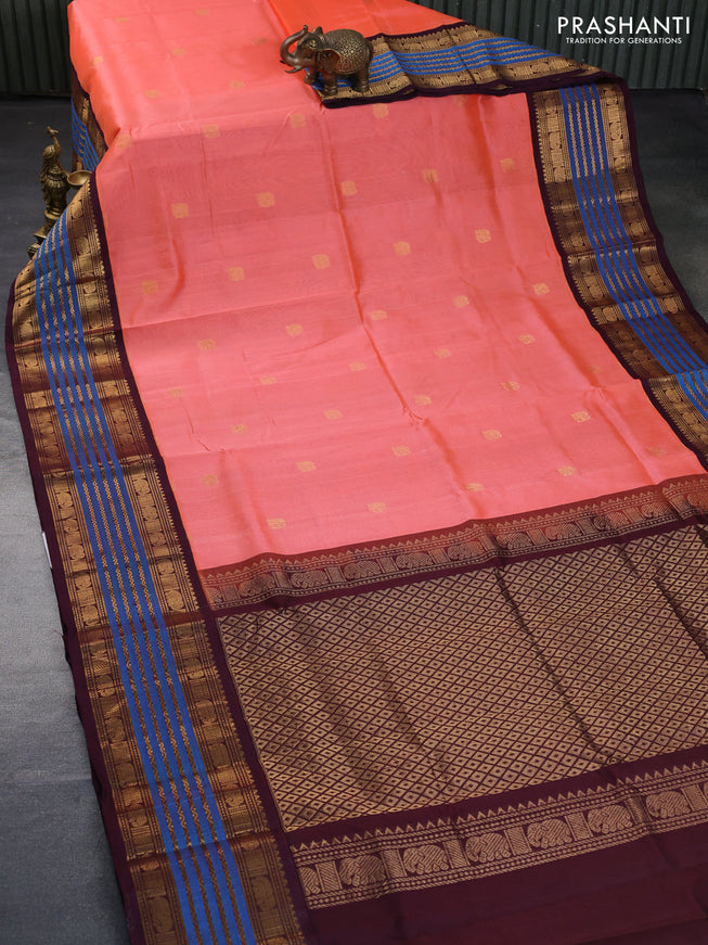 Silk cotton saree peach pink and wine shade with zari woven elephant buttas and long zari woven korvai border