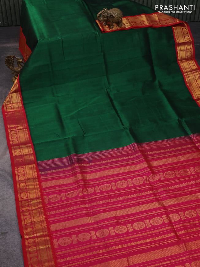 Silk cotton saree green and pink with plain body and zari woven korvai border