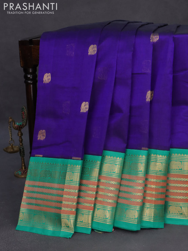 Silk cotton saree blue and teal blue with zari woven elephant buttas and long zari woven korvai border