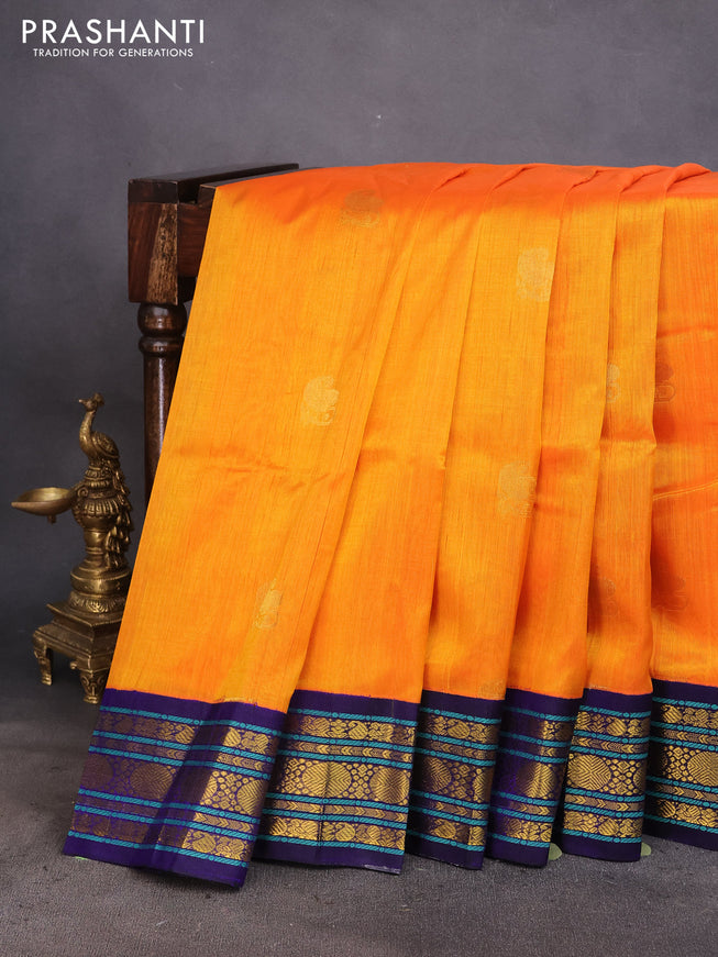 Silk cotton saree orange and blue with zari woven paisley buttas and zari woven korvai border