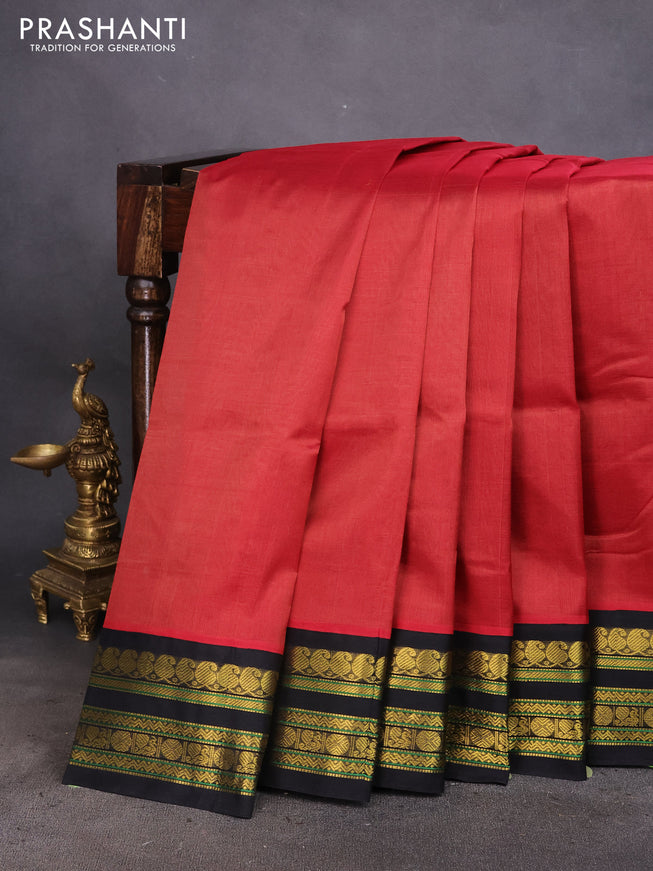 Silk cotton saree maroon shade and black with plain body and zari woven korvai border