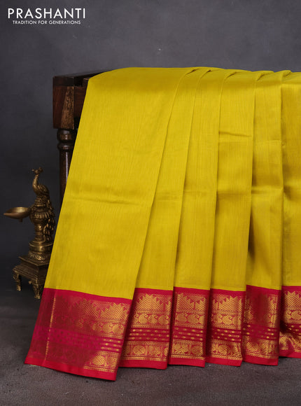 Silk cotton saree lime yellow and pink with plain body and zari woven korvai border