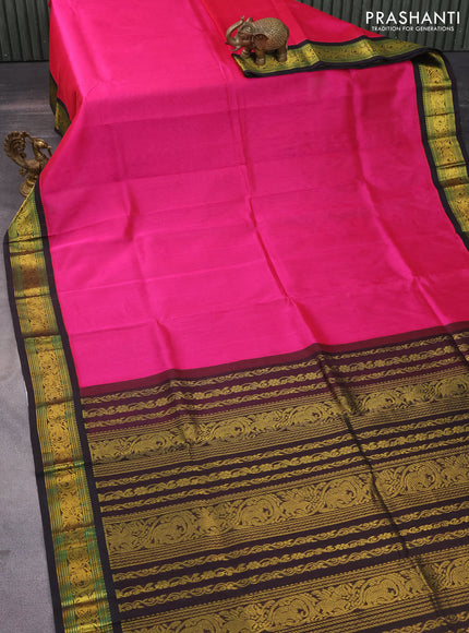 Silk cotton saree pink and coffee brown with plain body and zari woven elephant korvai border