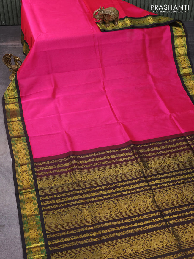 Silk cotton saree pink and coffee brown with plain body and zari woven elephant korvai border