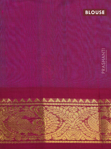 Silk cotton saree dual shade of teal green and magenta pink with zari woven annam buttas and zari woven korvai border