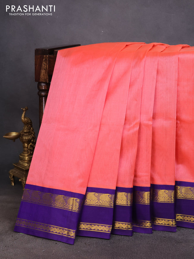 Silk cotton saree peach shade and blue with plain body and rettapet zari woven korvai border