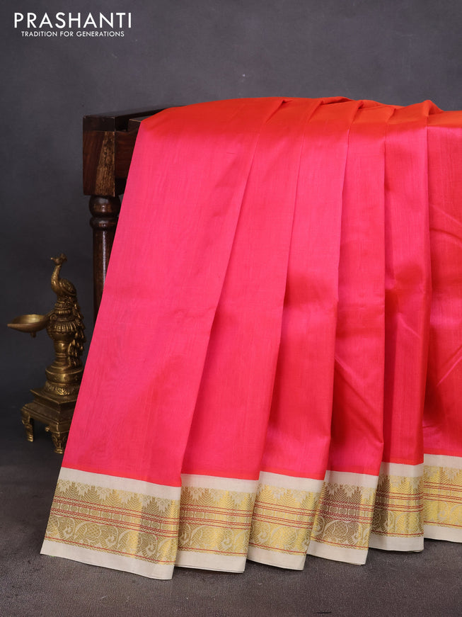 Silk cotton saree pink and cream with plain body and zari woven korvai border