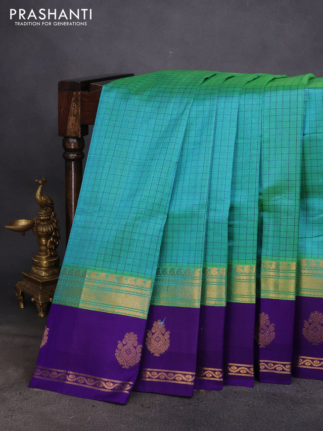 Silk cotton saree dual shade of teal green and violet with allover thread checked pattern and rettapet zari woven korvai butta border