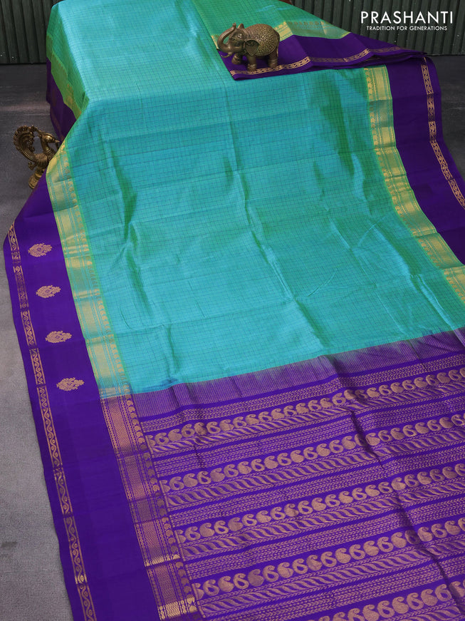 Silk cotton saree dual shade of teal green and violet with allover thread checked pattern and rettapet zari woven korvai butta border